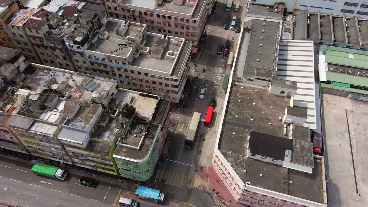 Aerial establish shot of Hong Kong Kowloon Walled City, a densely populated slum,