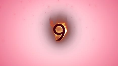 animation of red kaleidoscopic shapes over number 9 in flames, on pink background