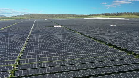 drone shot of solar farm, camera orbiting field of solar panels, shot at mid day, in warwick queensland australia 4k