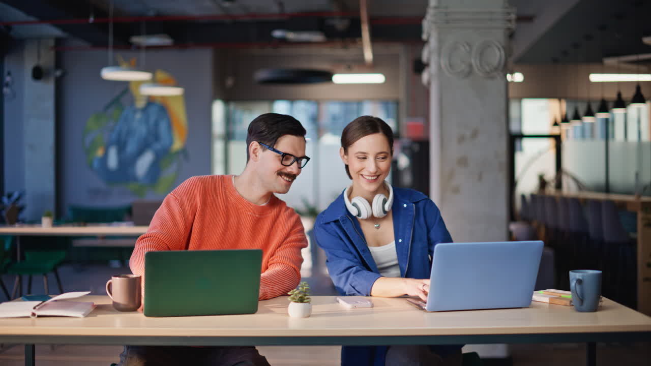 Productive coworkers creating startup giving five at shared workplace closeup