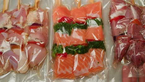 prepared chicken and salmon skewers