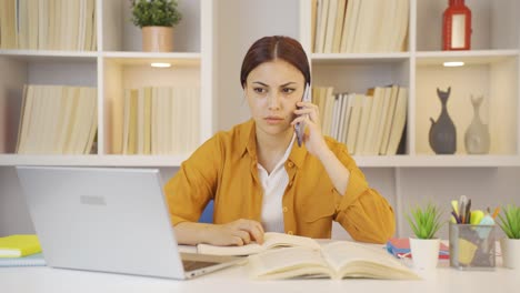 Female-student-receiving-bad-news-on-the-phone.