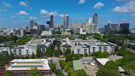 downtown atlanta with apartment complex in the foreground in georgia, usa. - aerial shot