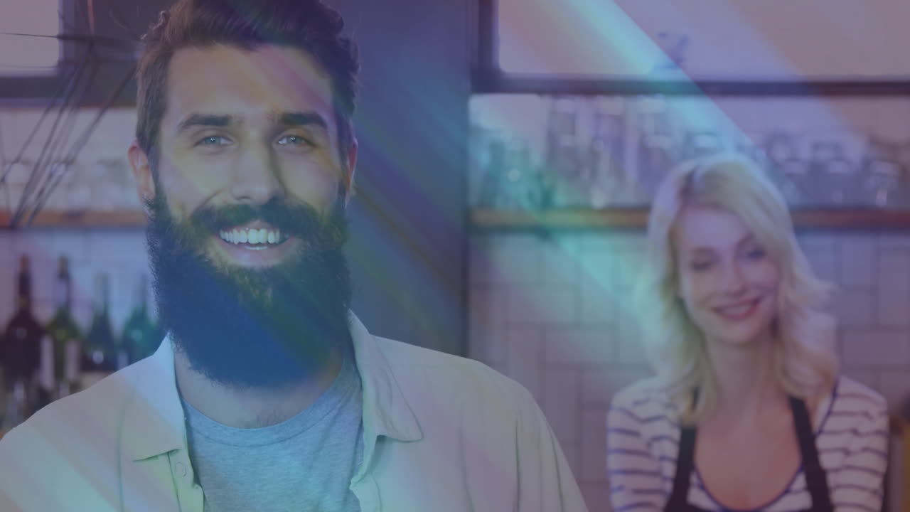 In kitchen, man and woman standing with colorful light effects animation