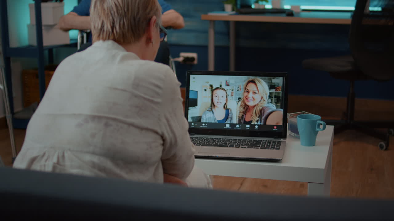 Family video call on laptop