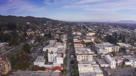 descending aerial shot flying over downtown ventura, california