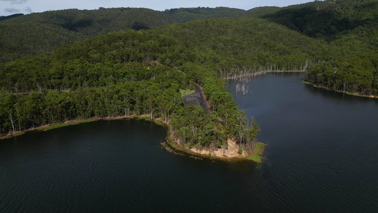 Left to right aerial views of Advancetown Lake near the Western Boat Ramp on the Gold Coast Hinterland.