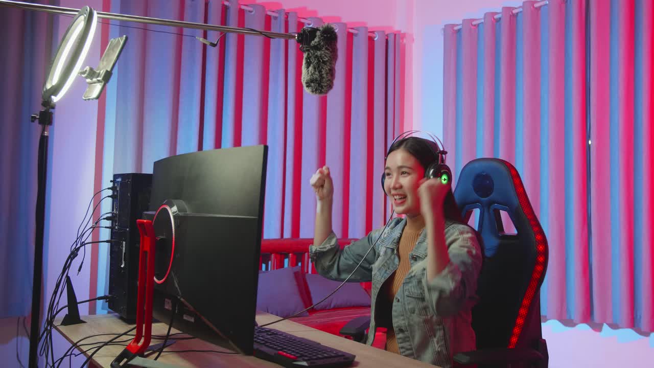 Young Streamer Girl Win While Playing Video Game On Computer And Talking