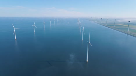 huge windmill turbines, offshore windmill farm in the ocean westermeerwind park , windmills isolated at sea on a beautiful bright day netherlands flevoland noordoostpolder