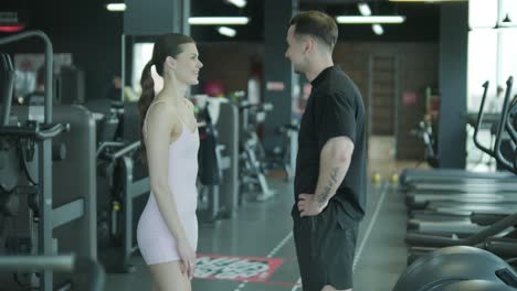 couple talking in a gym