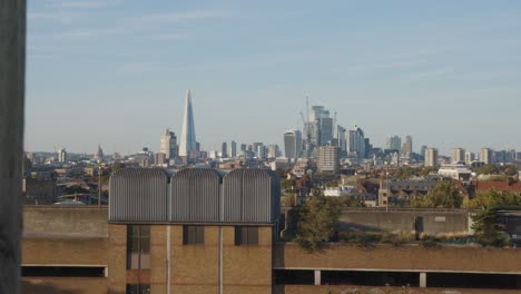 view of office buildings and skyline of city of london from peckham in south london uk 1