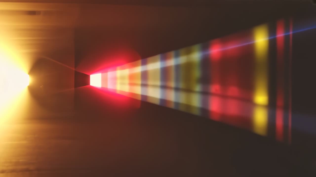 Emitting white beam from prism refracting hue bands across chamber walls, and golden orb emerging
