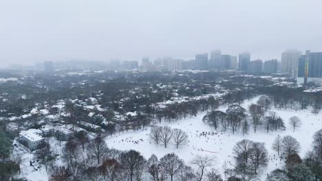 aerial shot of snow covered midtown suburbs in atlanta, georgia on january 10th 2025.