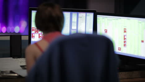 Girl-works-at-the-computer-during-theatrical-performance