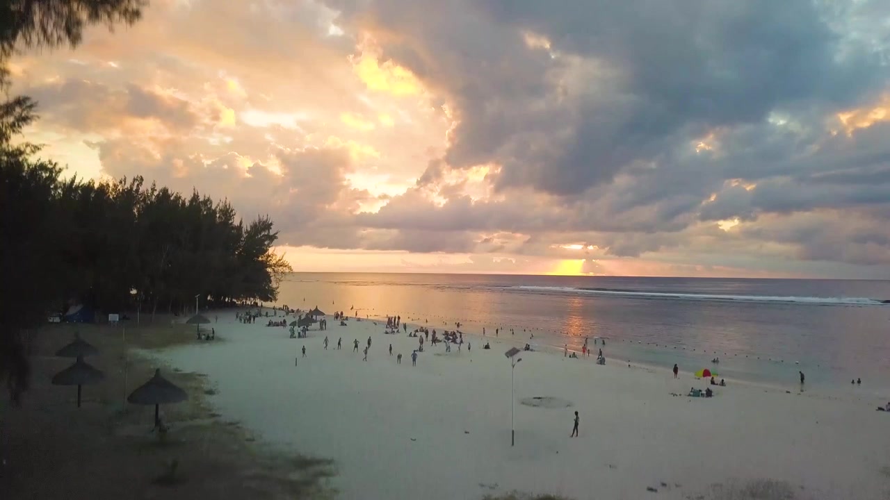 Sunset beach taking off aerial shot 4k