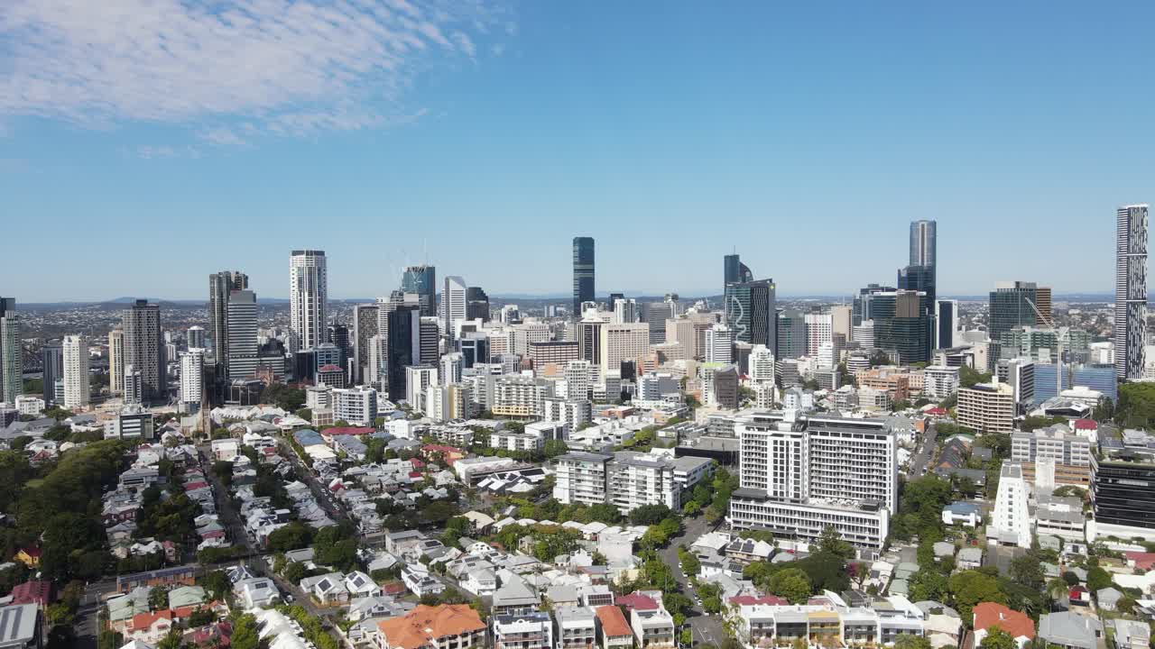 Aerial views of Spring Hill and Fortitude Valley with the towering skyline of the Brisbane City Central Business district.