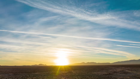 Mojave-Desert-sunset-with-a-silhouette-of-mountains---aerial-hyper-lapse