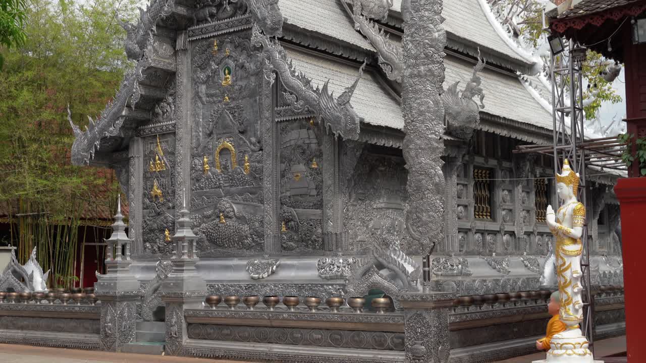 Thailand, Chiang Mai, Tilt down of the Famous Silver Temple,Wat Si Supan on a cloudy day.Build completely from silver metal.No people around.