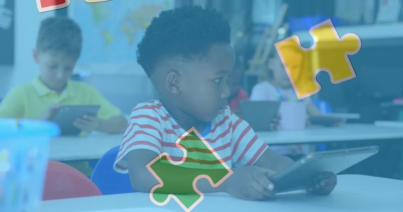 Diverse Elementary Students Using Digital Tablets in Classroom