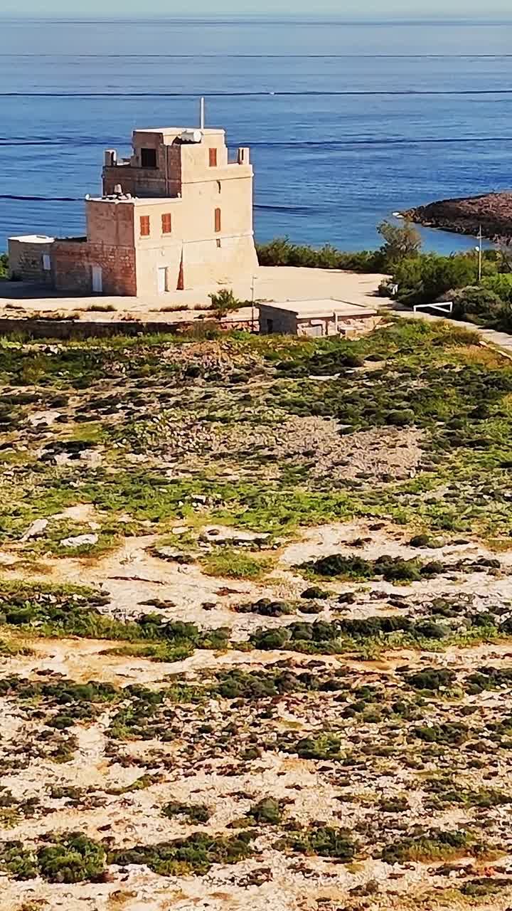 Visit to a tower on Malta's coastline surrounded by nature and sea