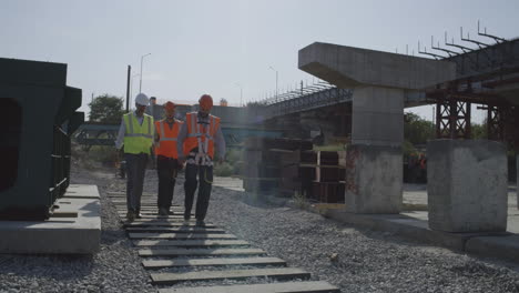 construction workers on a bridge project