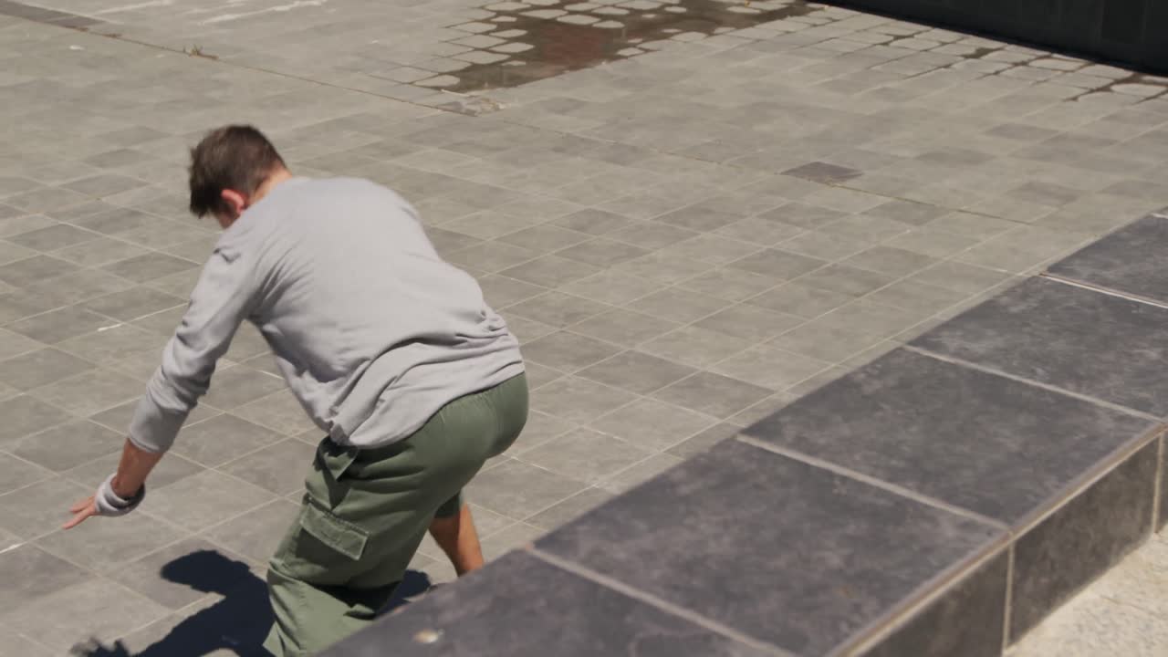 Caucasian man practicing parkour
