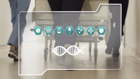 animation of dna strand and icons over diverse doctors at hospital