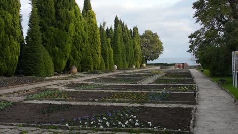 View-of-the-Botanical-Garden-complex-in-Balchik,-Bulgaria-with-the-Black-Sea-in-the-background