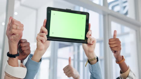 team celebrating success with green screen tablet