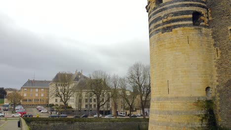 structure and garden of château d'angers in angers town, france - tilt down