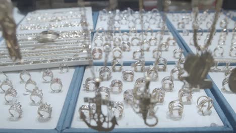 gold and silver jewelry sparkle in the abundant window display