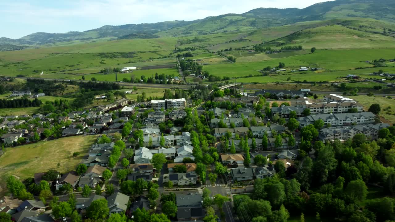 Aerial View of a Suburban Community Nestled in a Lush Green Valley