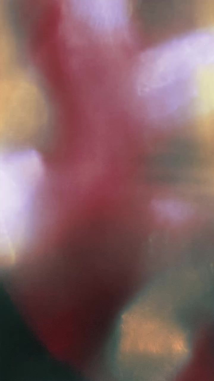 Abstract Light Leaks and Bokeh Effects on Dark Background