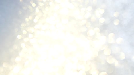 fondo plateado abstracto desfocado decorativo con brillo brillante. fondo festivo y navideño para texto. imágenes en 4k