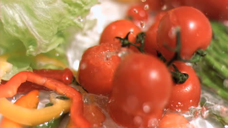 tomatoes falling down in super slow motion