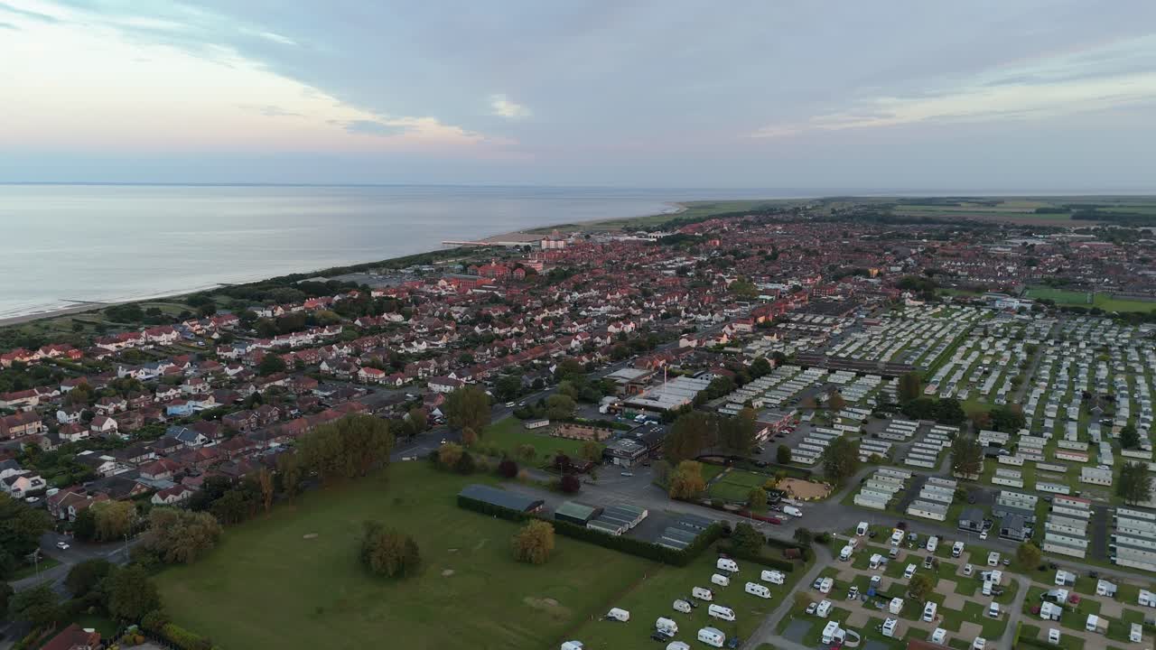 Aerial View of a Coastal Town and Caravan Park at Dusk