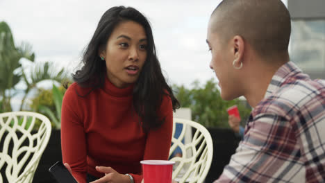 Friends-discussing-on-a-rooftop