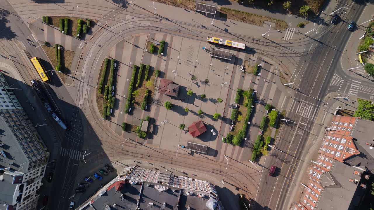 Aerial View of a City Square with Tram Lines