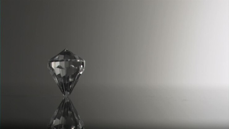 Clear diamond in super slow motion spinning