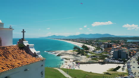 Aerial-Footage-of-Saquarema-Church,-Saquarema-Beach,-Saquarema-Lagoon,-and-Saquarema-Downtown-in-Rio-de-Janeiro,-Brazil