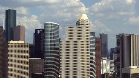 high-angle aerial drone view of skyscrapers in downtown houston, texas