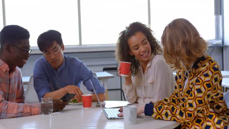 multi-ethnic business people interacting with each other in modern office 4k