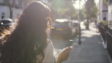 beautiful indian woman walking through city