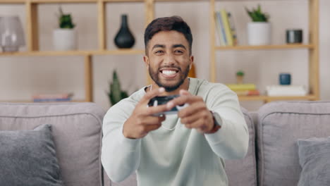 gaming console, sofa and happy man winning
