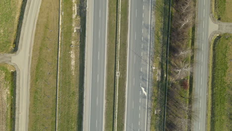 Aerial-shot-of-top-down-expressway-outside-the-city-in-Poland-road-s7