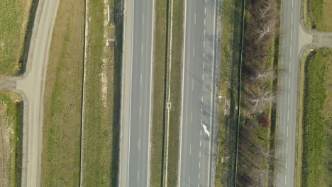 aerial shot of top down expressway outside the city in poland road s7