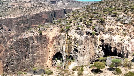 scenic limestone cave in diksam plateau, socotra island, yemen - aerial drone shot