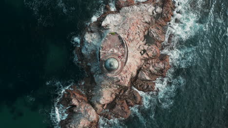 lighthouse on a rocky island