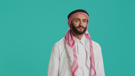 young arab guy saying yes and nodding