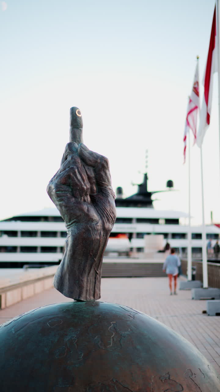 Et Purus sculpture in Monte Carlo, Monaco with a blurry background. Vertical